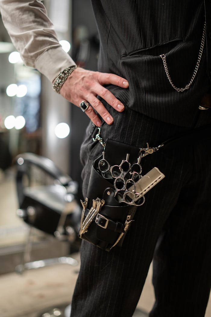 Close-up of a barber's tools in an elegant, modern barber shop.